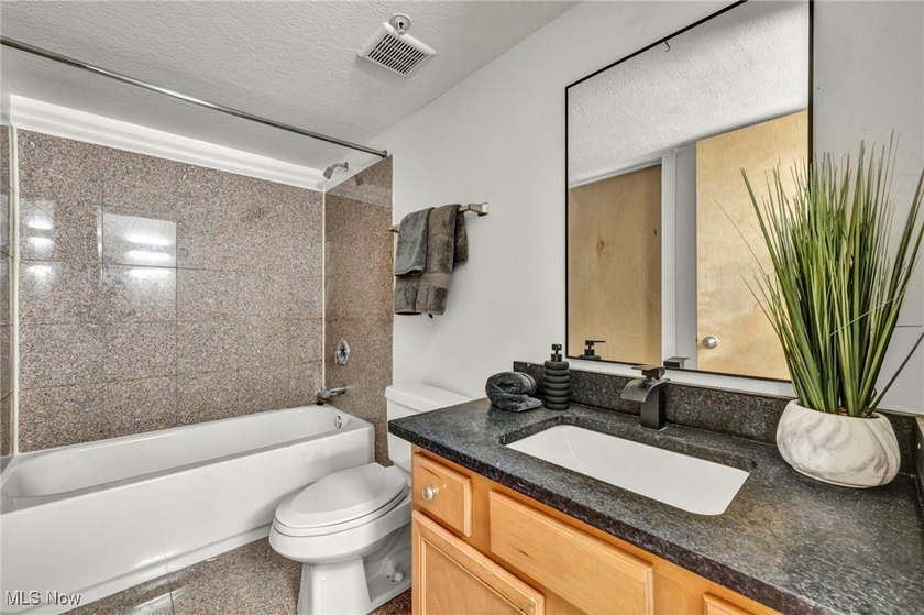 Experience modern and convenient city living in this stylish - photo 23