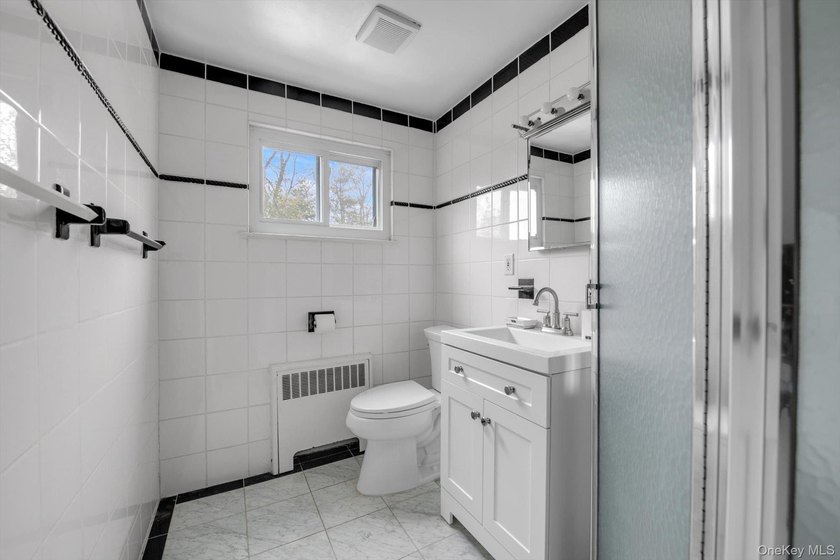 Nestled on a quiet, tree-lined street in a highly desirable - photo 13
