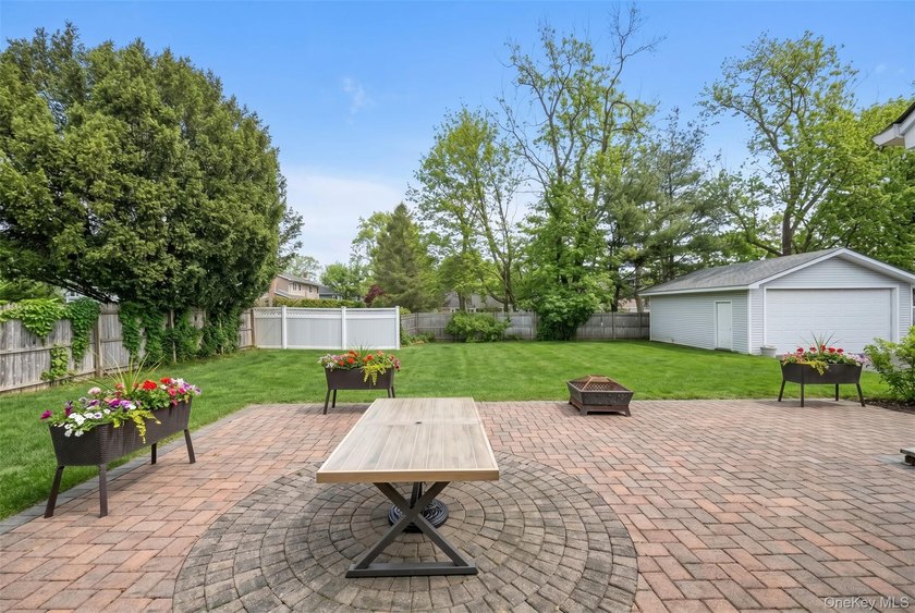 Nestled on a quiet, tree-lined street in a highly desirable - photo 18