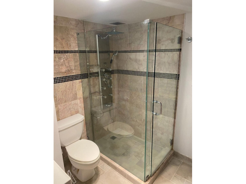 This spacious 2-bedroom, 2-bathroom unit features an open living - photo 6
