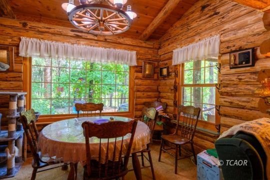 Welcome to your dream home-a stunning log cabin blending classic - photo 12