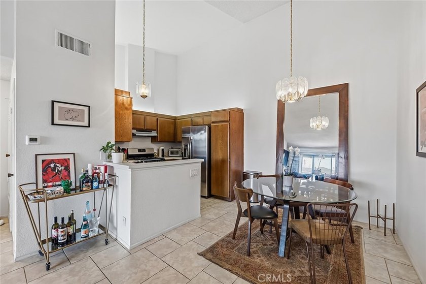 Open and airy second-floor condominium with soaring vaulted - photo 13