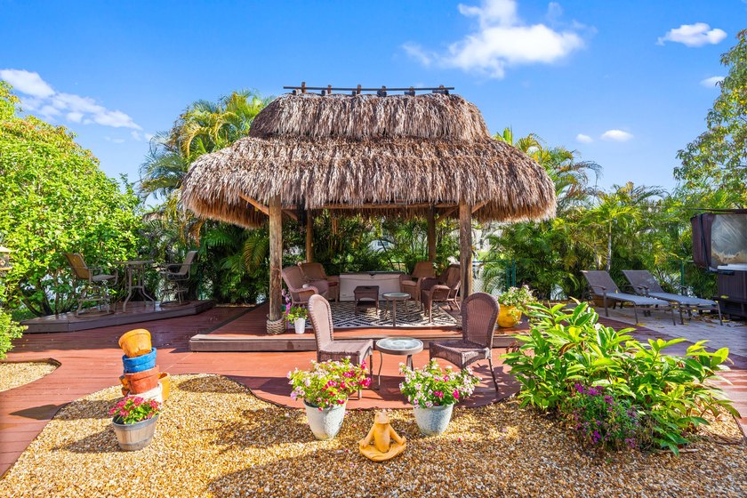 This charming one-story home features a spacious open floor plan - photo 5