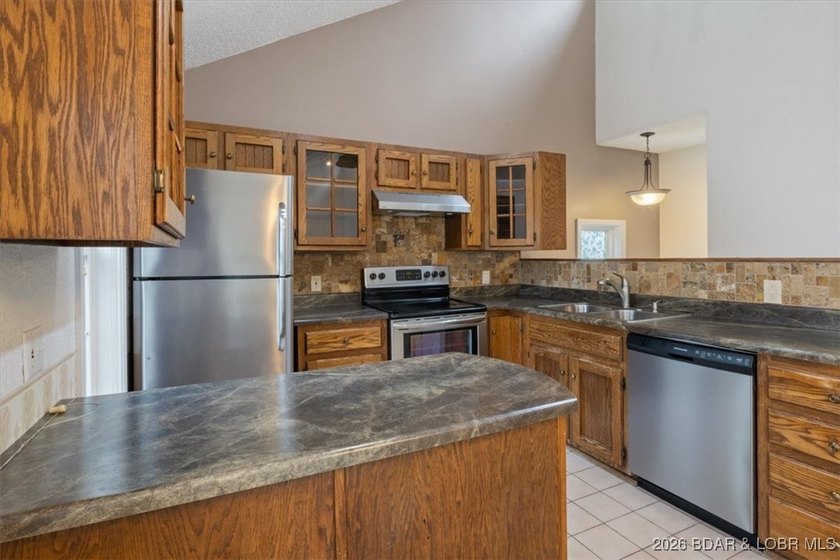 Experience Lake of the Ozarks living at its best in this - photo 11