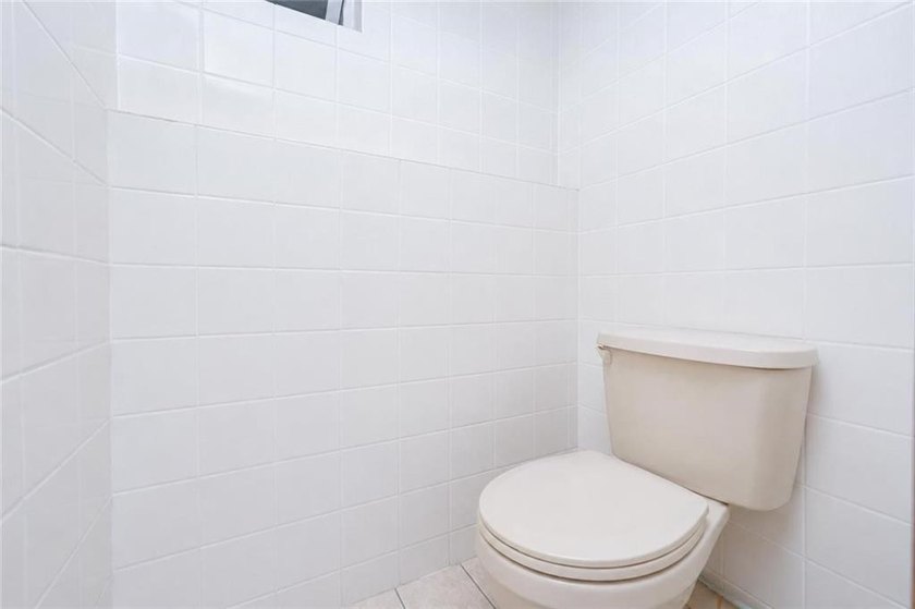 Welcome to this legal two-family solid brick home, conveniently - photo 22