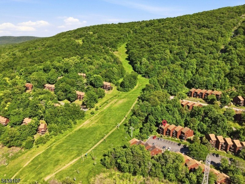 Enjoy breathtaking views from this 2 bedroom, 1 bath end unit - photo 22
