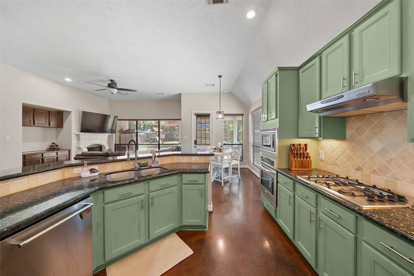Stunning Country style stone home nestled on 1.5 acres with the - photo 14