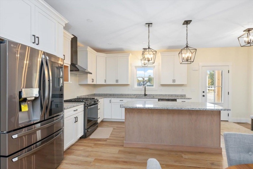 Grab your hiking boots and golf clubs and move right in! And the - photo 3