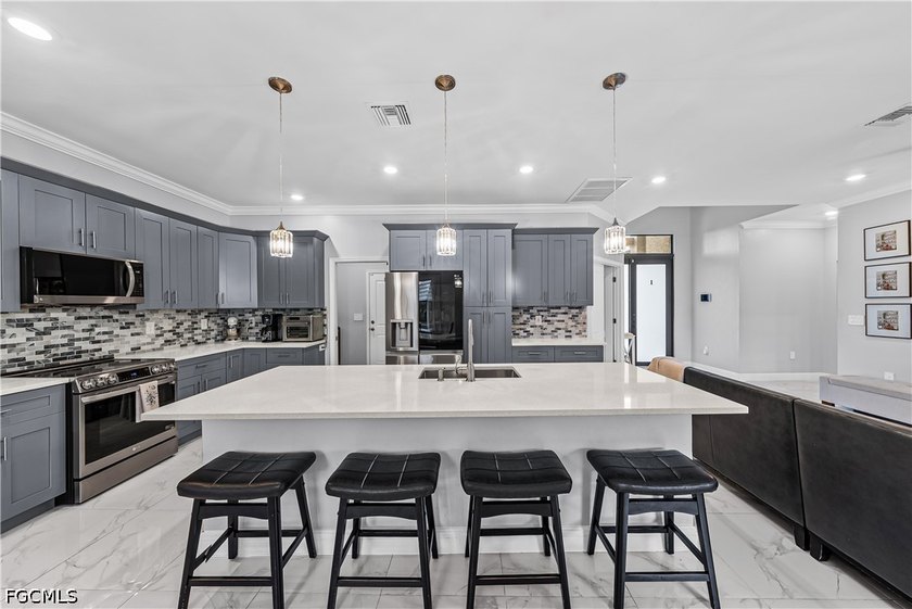Situated on a spacious half-acre lot in the highly desirable - photo 6