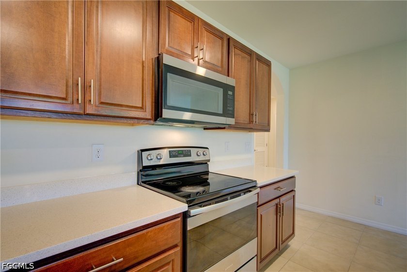 Welcome to this beautifully maintained 4-bedroom, 2-bath home in - photo 3