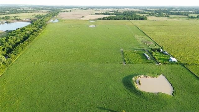 Nearly 64 acres of beautiful, cleared land-ready for livestock - photo 4