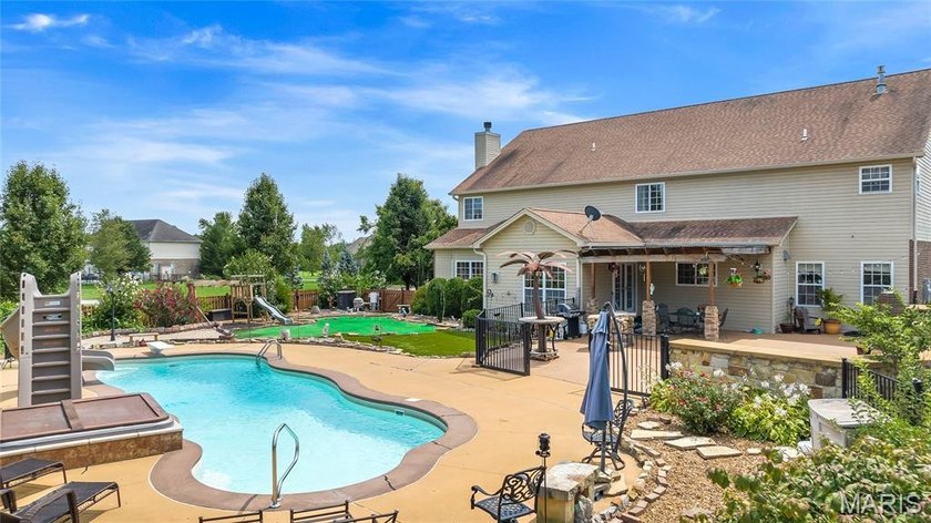 Nestled on 1.3 picturesque acres backing to the community lake - photo 5