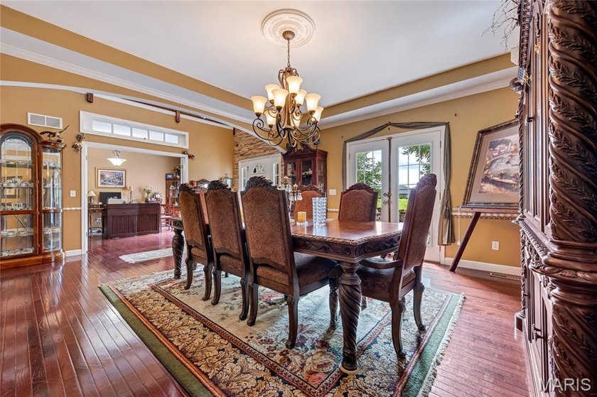 Nestled on 1.3 picturesque acres backing to the community lake - photo 8