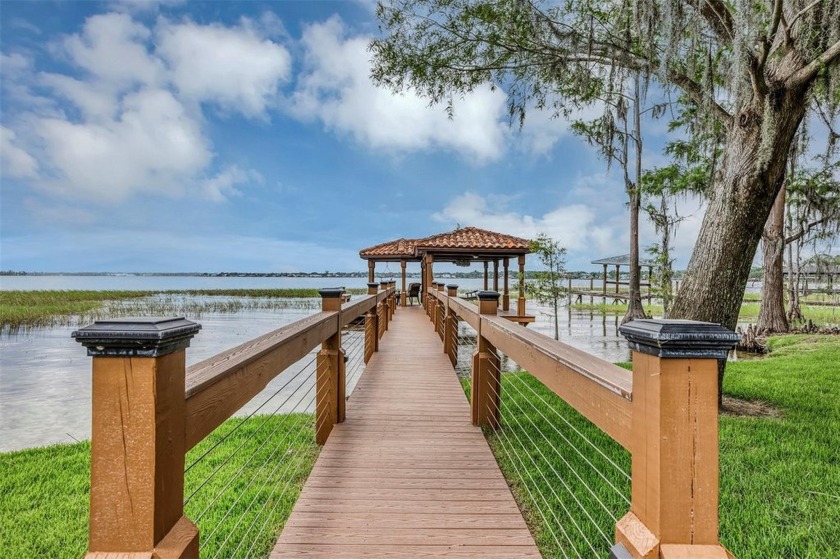 Discover this exquisite lakefront property nestled on over 1.9 - photo 7