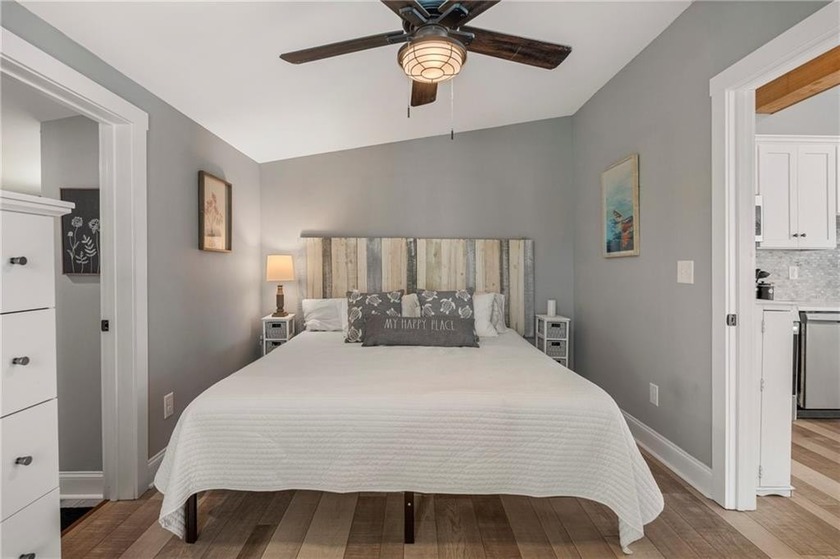 Wake up to breathtaking waterfront views in this stunning home - photo 16