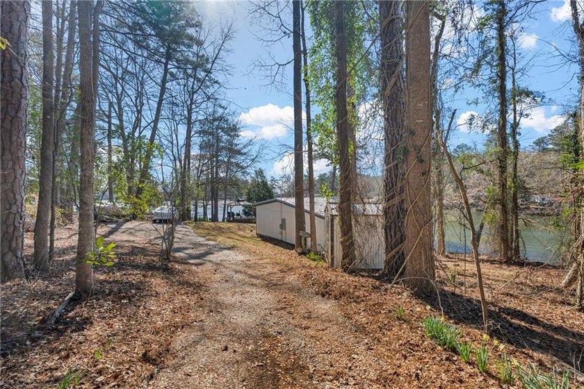 Wake up to breathtaking waterfront views in this stunning home - photo 25