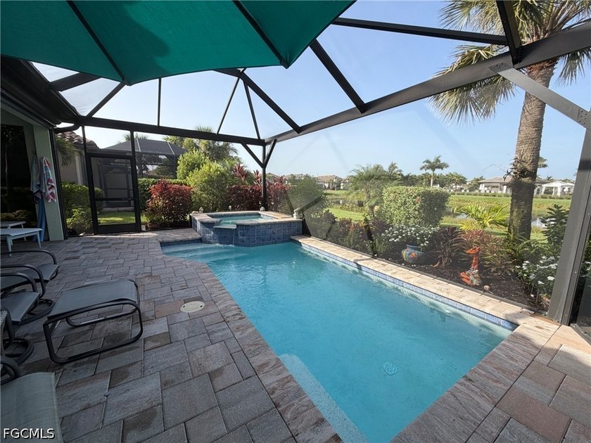 One of a kind! This like-new home features a private heated pool - photo 2