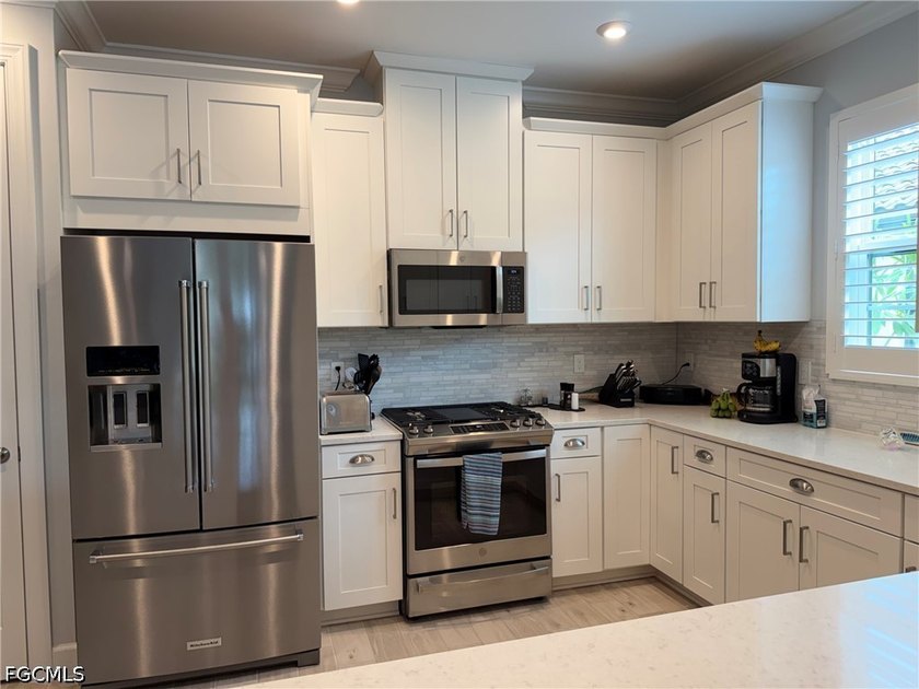 One of a kind! This like-new home features a private heated pool - photo 8