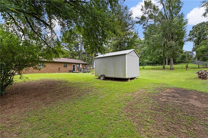Welcome home to this charming 3-bedroom, 1.5-bath property - photo 29