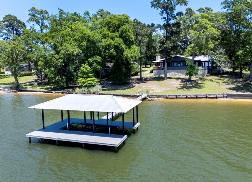 Experience waterfront living at its finest at 64 Poya Point on - photo 2