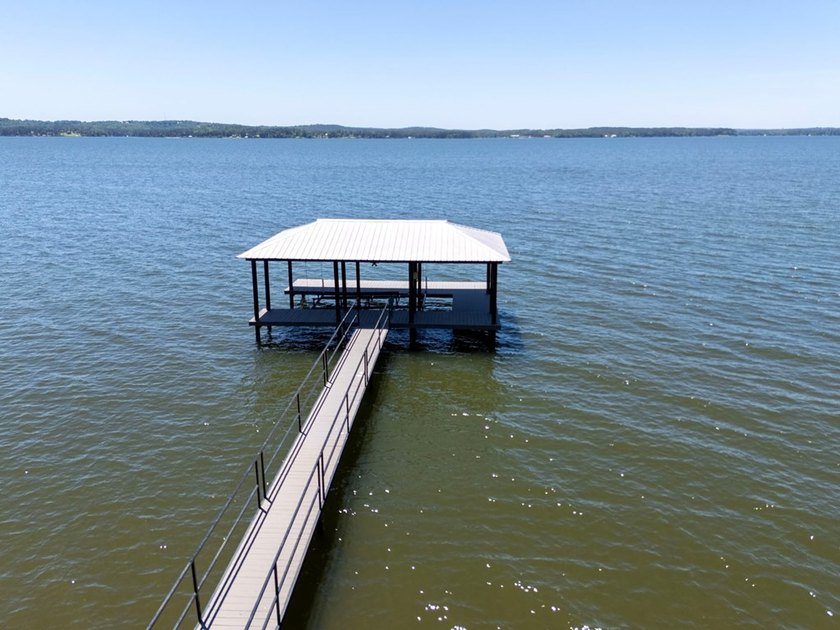 Experience waterfront living at its finest at 64 Poya Point on - photo 3
