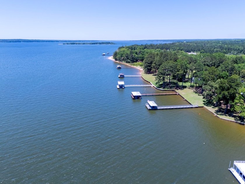 Experience waterfront living at its finest at 64 Poya Point on - photo 4