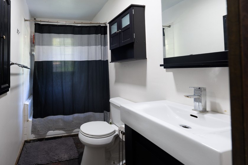 Welcome to your own retreat! Nestled on 1.25 wooded acres in - photo 12