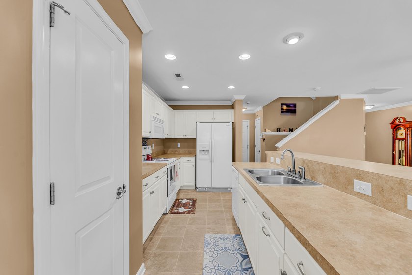 Well-maintained townhome in the desirable area, of The Pines @ - photo 13