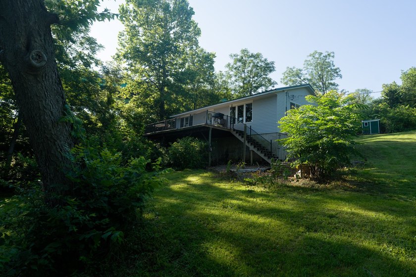 Welcome to your own retreat! Nestled on 1.25 wooded acres in - photo 20