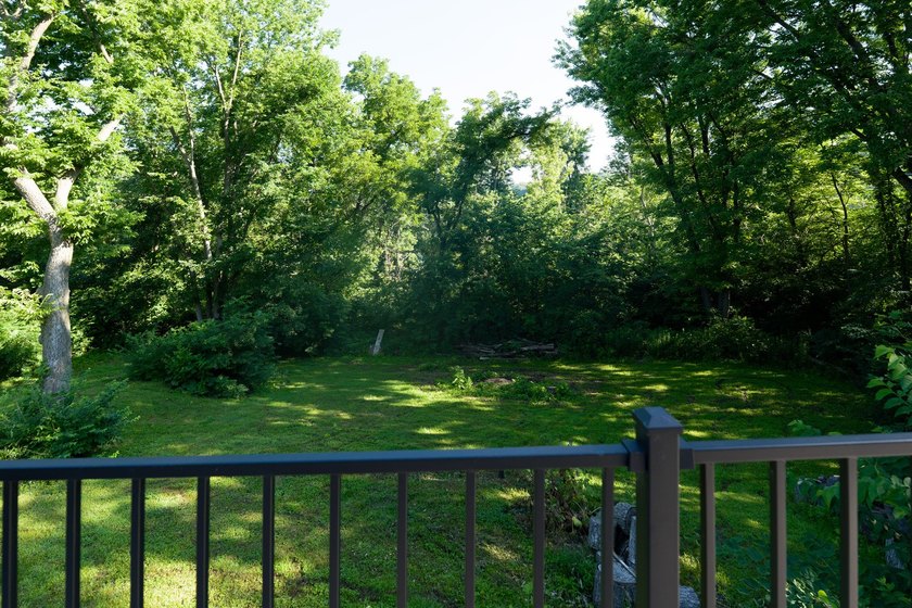 Welcome to your own retreat! Nestled on 1.25 wooded acres in - photo 21