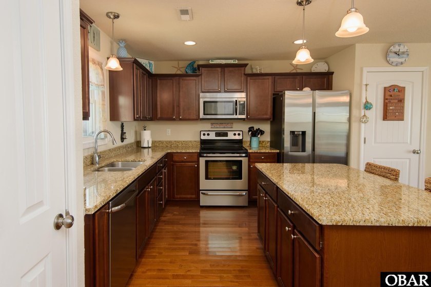 Experience waterfront living at its finest in this beautiful - photo 8