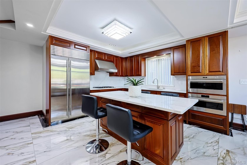 Welcome to this luxury detached two-family residence located in - photo 13