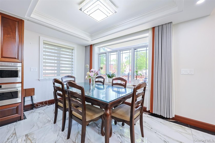 Welcome to this luxury detached two-family residence located in - photo 18