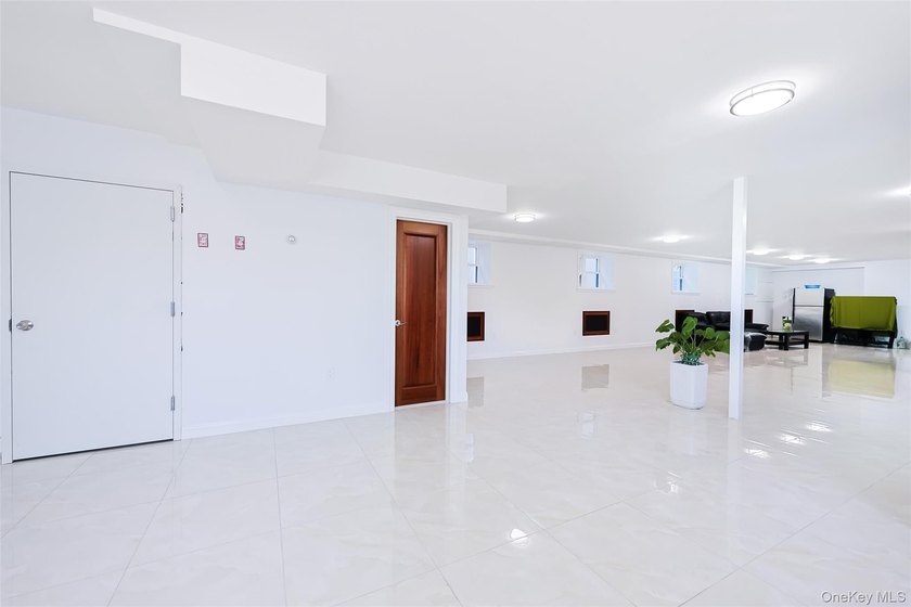 Welcome to this luxury detached two-family residence located in - photo 19