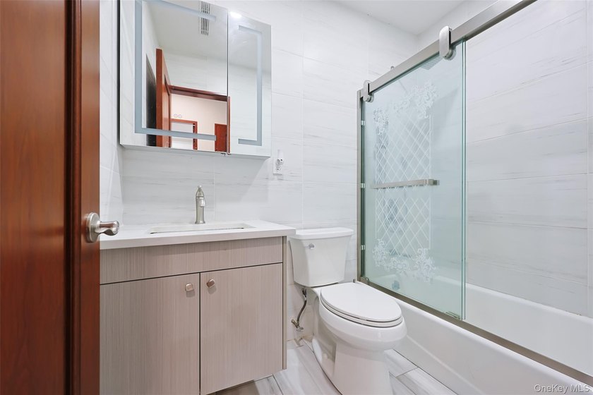 Welcome to this luxury detached two-family residence located in - photo 26