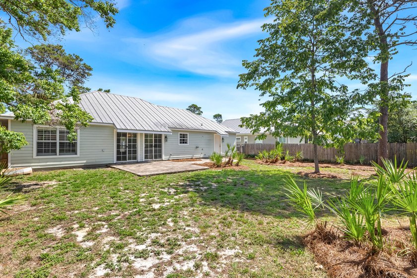 Charming coastal cottage just a few blocks from the sugar-white - photo 29