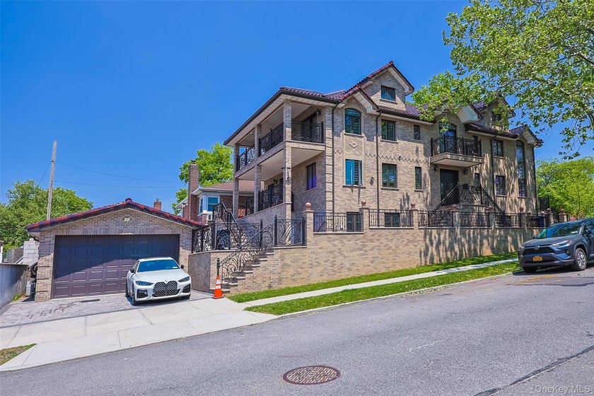 Welcome to this luxury detached two-family residence located in - photo 45