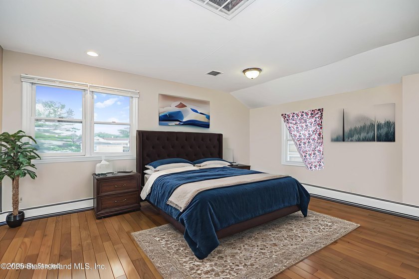 Welcome to 201 Van Name Avenue - a beautifully renovated - photo 12