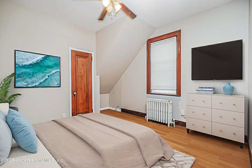 Welcome to 201 Van Name Avenue - a beautifully renovated - photo 14