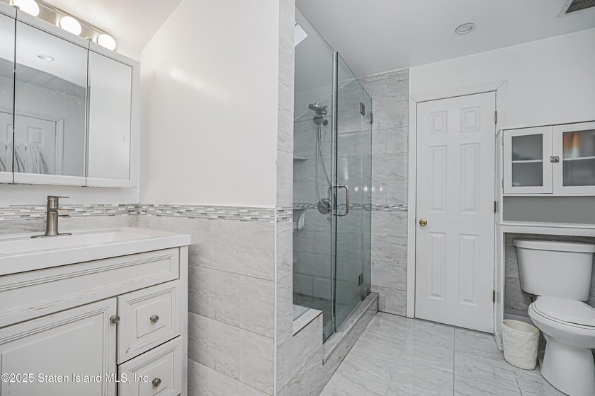Welcome to 201 Van Name Avenue - a beautifully renovated - photo 15