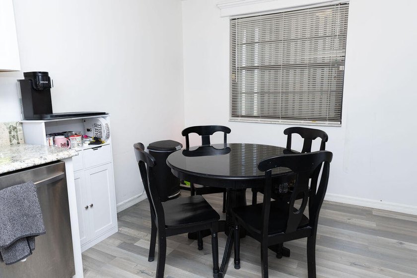 This charming home features updated kitchen and bathrooms with - photo 7