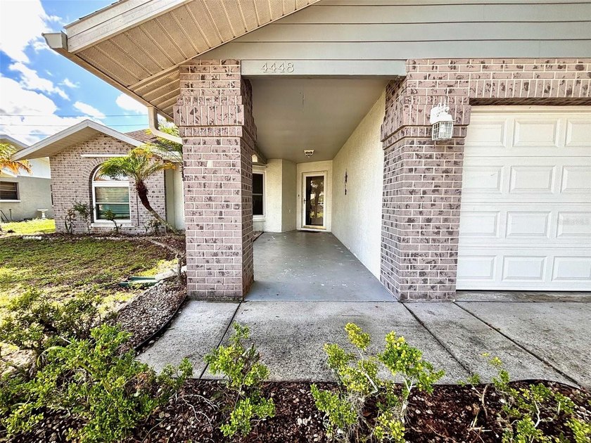Located in the community of Wood Trail Village, this 3-bedroom - photo 2