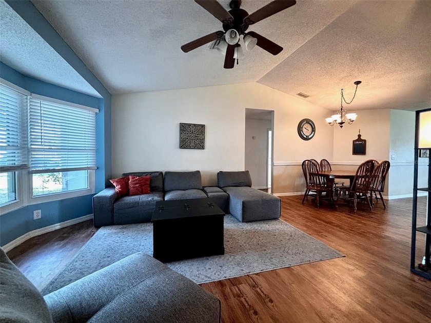 Located in the community of Wood Trail Village, this 3-bedroom - photo 3