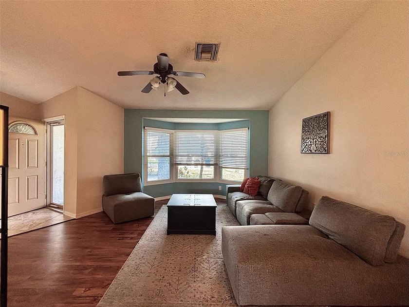 Located in the community of Wood Trail Village, this 3-bedroom - photo 4