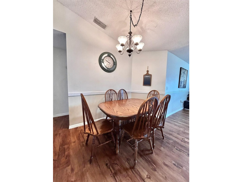 Located in the community of Wood Trail Village, this 3-bedroom - photo 6