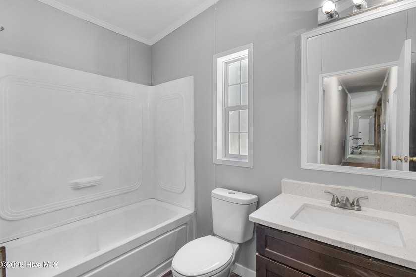 Welcome home to this 4-bedroom, 3-bath home with a versatile - photo 26