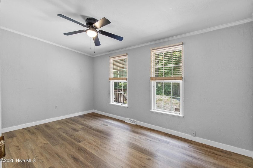 Welcome home to this 4-bedroom, 3-bath home with a versatile - photo 27