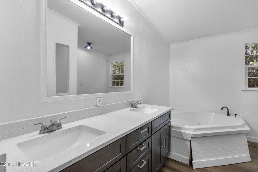 Welcome home to this 4-bedroom, 3-bath home with a versatile - photo 33
