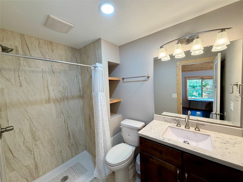 Escape to the Northwoods with this beautifully renovated - photo 13
