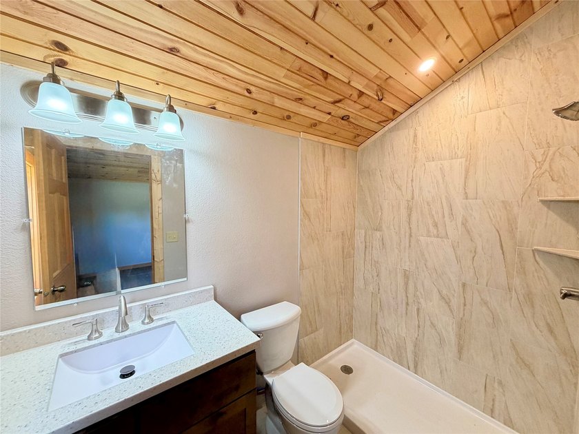 Don't let the size fool you, this beautifully updated cabin - photo 12